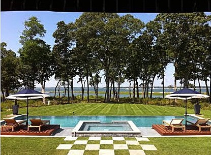 Mariah Carey and husband Nick Cannon's summer Hamptons rental stays secluded behind the trees but offers direct access to the beach.