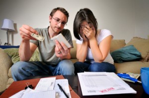 Couple-looking-at-bills-300x198.jpg