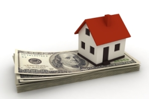 Home on stack of bills
