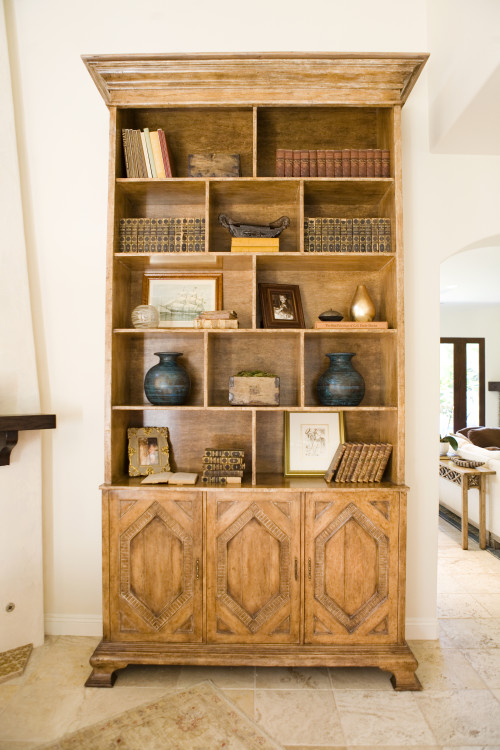Antique books and found items create visual interest.