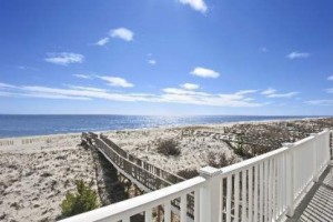 This 3-bedroom Westhampton Beach home is right on the beach with views of the bay.