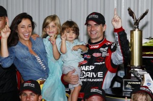 eff Gordon celebrates in victory lane with his wife Ingrid Vandebosch, daughter Ella Sofia and son Leo Benjamin after winning the NASCAR Sprint Cup Series auto race in August 2012. Source: Yahoo!