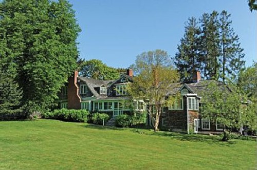 Designer Kate Spade's Southampton summer home once functioned as the boarding home for the Shinnecock Hills Summer School of Art. The home is now on the market for $4.75 million.
