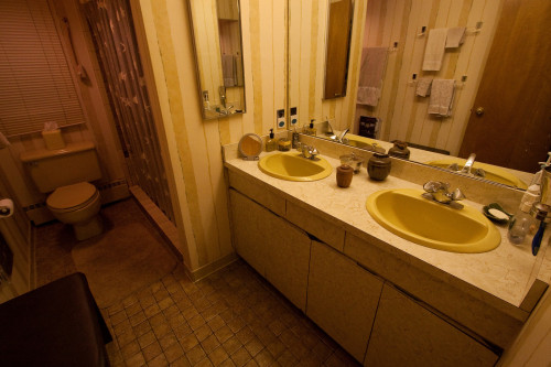 The bathroom previously was in major need of an overhaul. Source: