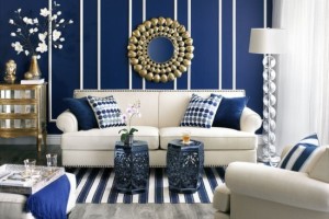 Blue pops against the white molding on the walls.