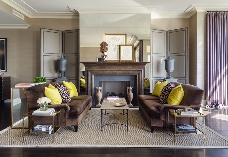 A rug defines the seating area in a room.
