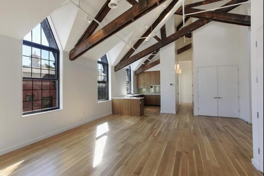 This three-bedroom retains the vaulted ceilings of the original church
